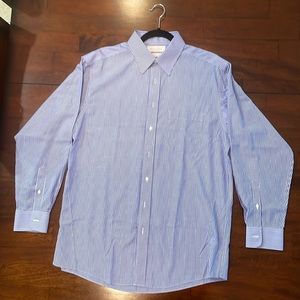 Gold label, blue and white striped long sleeve shirt.